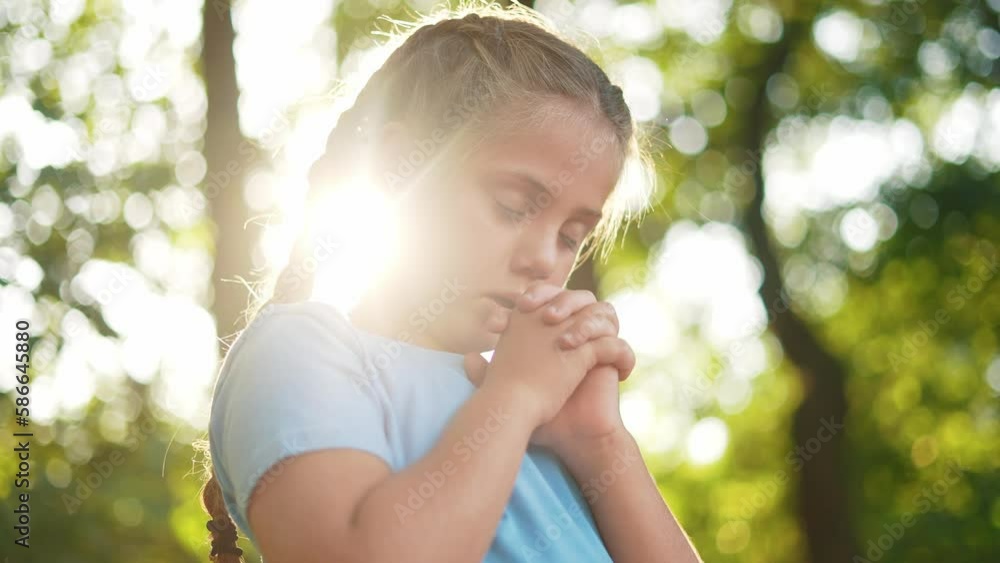 child pray. young gratitude a god religion concept. little girl in nature outdoors praying dreams lifestyle of happiness to god. praise worship freedom concept. kid praying in the forest child pray. young gratitude a god religion concept. little girl in nature outdoors praying dreams lifestyle of happiness to god. praise worship freedom concept. kid praying in the forest