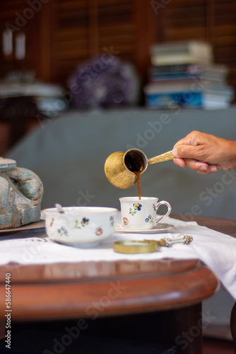 Coffee grounds reading. Fortune teller. Esoteric. Fortune telling. Woman reading fortune. cafeomancy