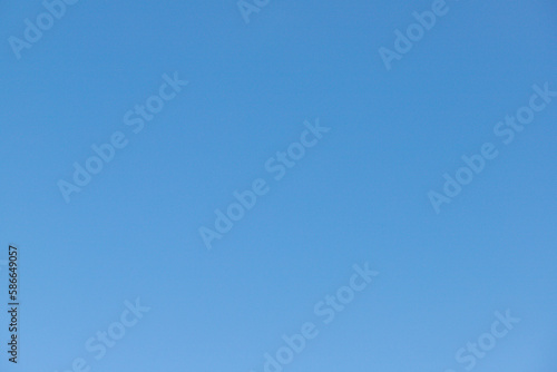 Blue sky with white clouds, background.