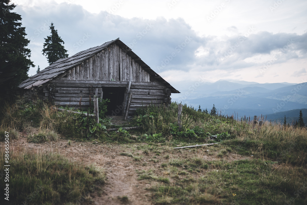 old wooden house in mountains