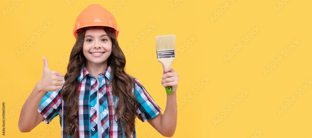 thumb up for success. happy teen girl hold painting brush. child painter in helmet. Child builder in helmet horizontal poster design. Banner header, copy space. thumb up for success. happy teen girl hold painting brush. child painter in helmet. Child builder in helmet horizontal poster design. Banner header, copy space.