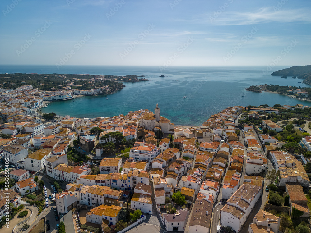 Aerial images of Cadaqués on the Costa Brava of Girona European tourist town on the border with France Catalonia images of the beach transparent turquoise blue sea