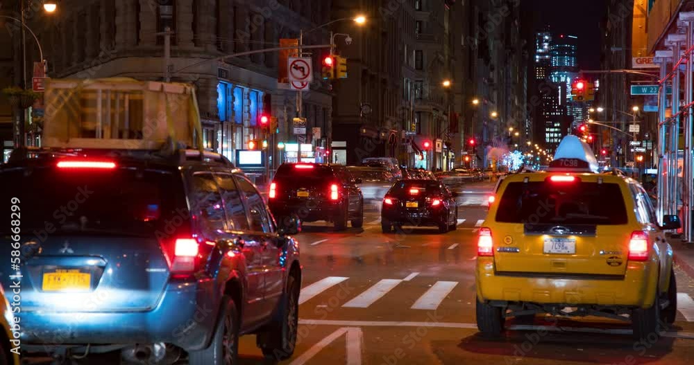 Lockdown Time Lapse Shot Of Vehicles Moving On Illuminated Street In City At Night - New York City, New York Lockdown Time Lapse Shot Of Vehicles Moving On Illuminated Street In City At Night - New York City, New York