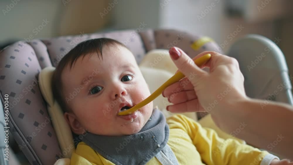 Healthy food. Cute baby girl face. beautiful a baby eats dirty. Healthy