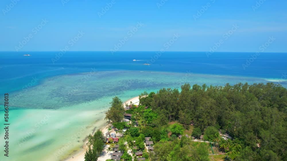 One can see the long stretch of white sand that runs along the coastline, and the clear blue waters that gently lap against it. which give it a secluded and intimate feel. (Koh Phangan, Thailand). 4K
One can see the long stretch of white sand that runs along the coastline, and the clear blue waters that gently lap against it. which give it a secluded and intimate feel. (Koh Phangan, Thailand). 4K
