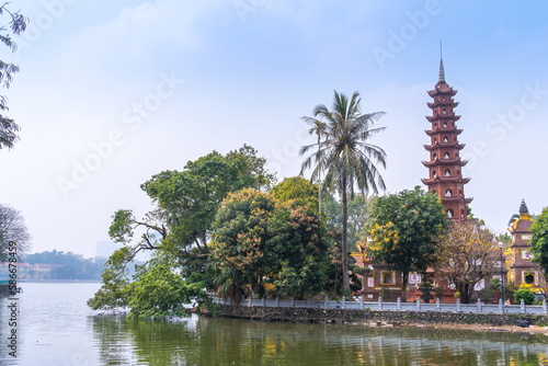 view of Tran Quoc pagoda in the morning, the oldest temple in Hanoi, Vietnam. Travel and landscape concept.