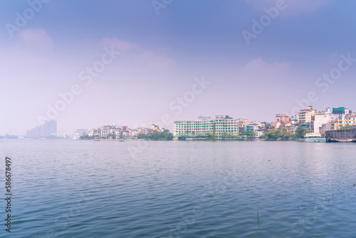 West lake and Truc Bach lake in foggy morning, Hanoi city, Vietnam. Travel and landscape concept.