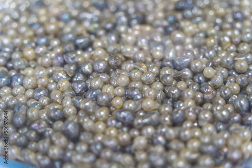 Pile of pearls on the white background. Vietnamese pearls in Ha Long city, Quang Ninh province, Vietnam