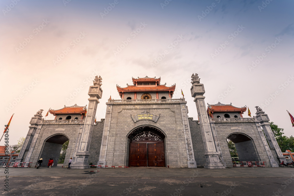 Fototapeta premium Main gate of Hung King Temple, Phu Tho Province, Vietnam. Text on gate in English meaning Hung King temple.