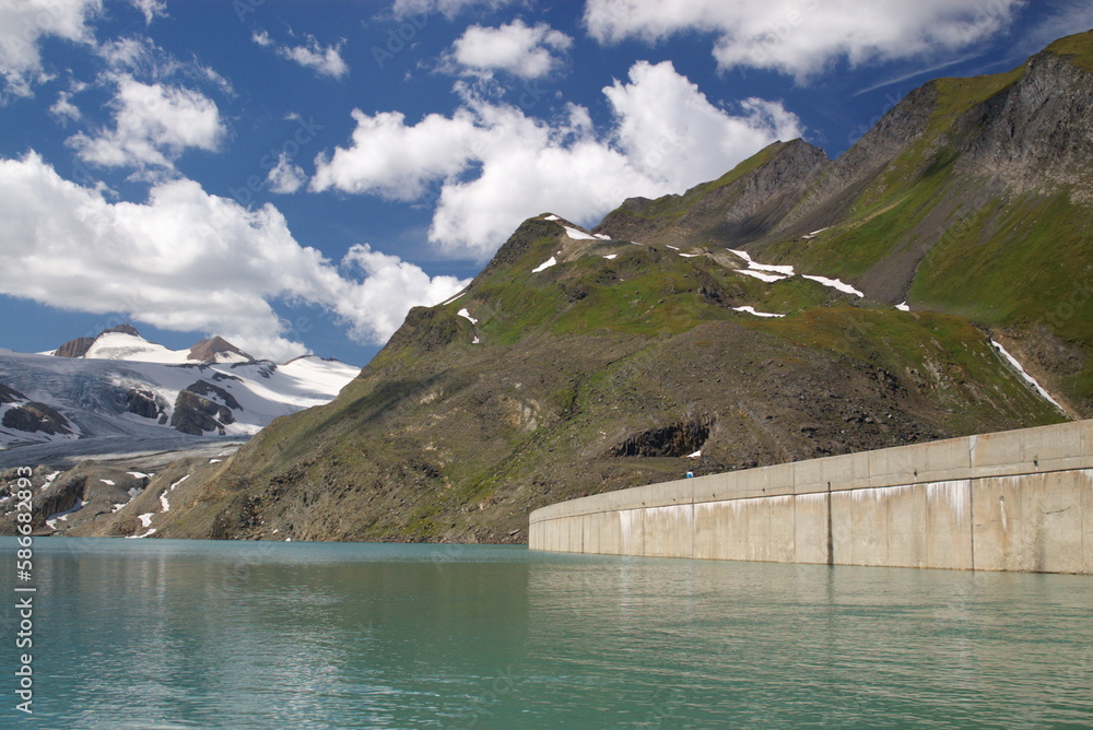dam in lake in the mountains