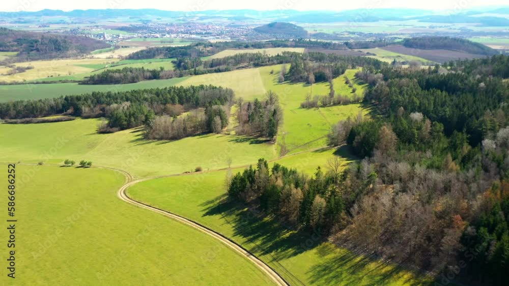 Forests and meadows, hills and valleys are a typical landscape in southwestern Bohemia. Camera flight over the Czech countryside. Carbon neutral agriculture in Central Europe. Forests and meadows, hills and valleys are a typical landscape in southwestern Bohemia. Camera flight over the Czech countryside. Carbon neutral agriculture in Central Europe.