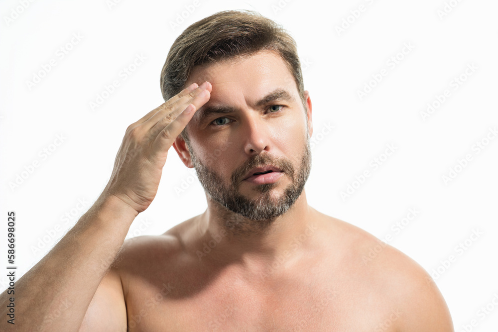 Fototapeta premium Close up face of handsome man. Portrait of shirtless man for skincare and beauty concepts. Handsome man with beauty face, facial skin portrait. Male healthy skin and spa concept.