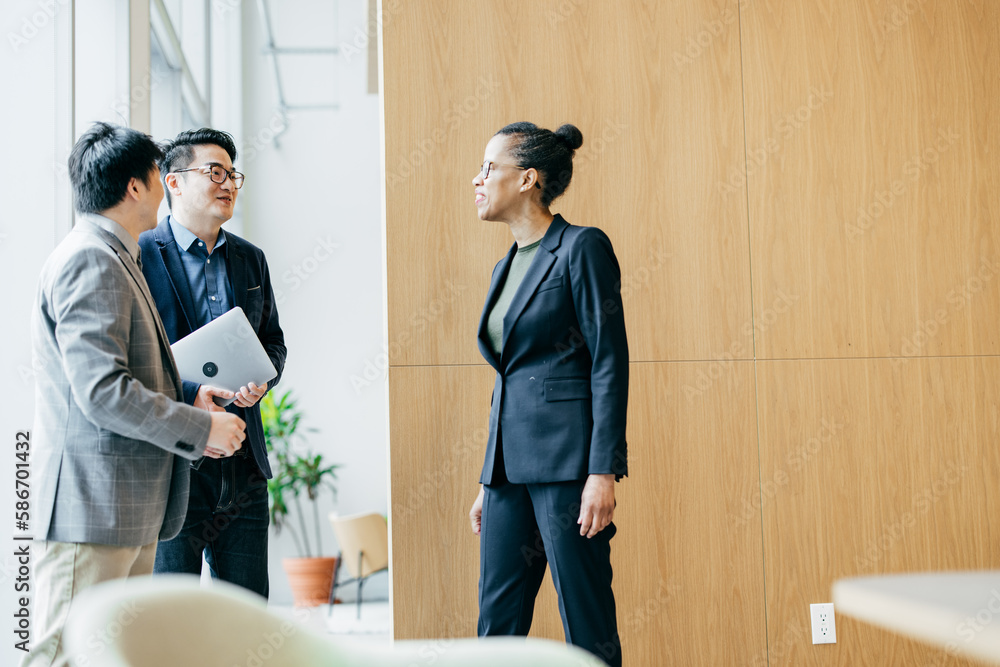 Business people in the office. Successful partnership shaking hands in the office.