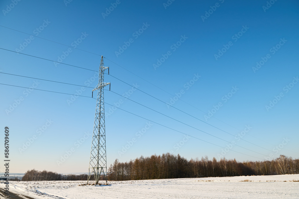 Wires and power pole against a cloudless blue sky Wires and power pole against a cloudless blue sky