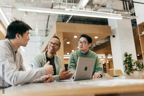 Photography Business colleagues in meeting discussing project
