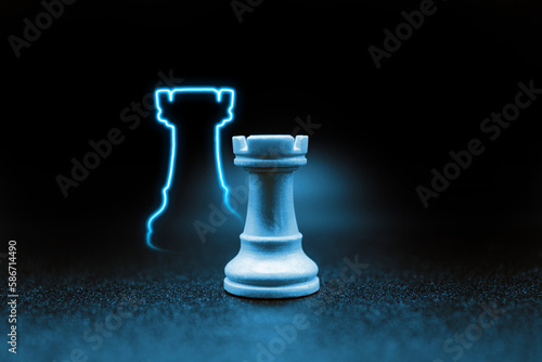 blue rook chess piece with led in the shape of the rook piece. close up photo with black background. chess piece illustration, horizontal, graphic, cyan