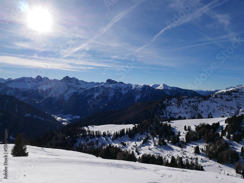 Sella Pass, Selva Val Gardena, Trentino Alto Adige, Italy: panoramic view of snow covered Canazei and Val di Fassa (Fassa Valley), from Sella Pass, Dolomites 