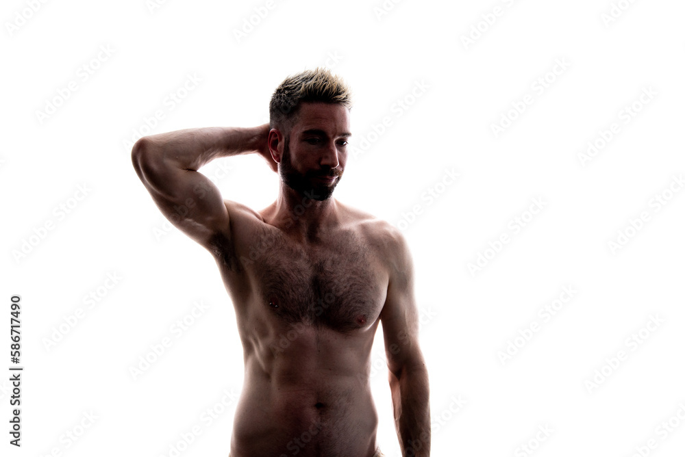 Portrait of a shirtless muscular young man on a white background. Portrait of a shirtless muscular young man on a white background.