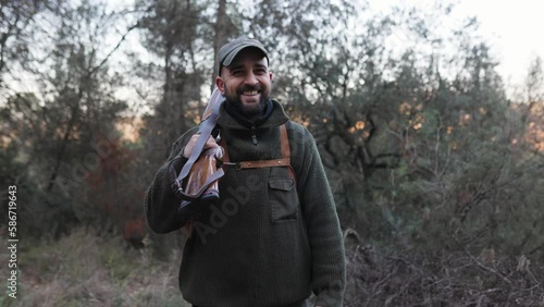 Wallpaper Mural Hunter man smiling while hunting outdoors with his dogs. Torontodigital.ca