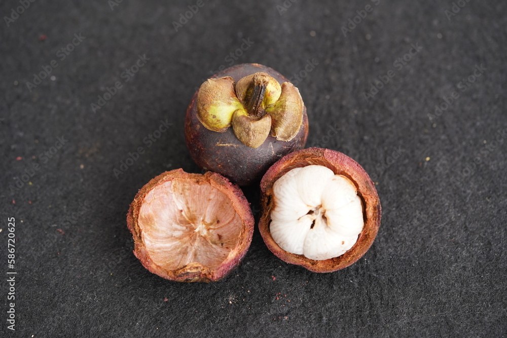 Mangosteen (Garcinia mangostana), also known as the purple mangosteen, is a tropical evergreen