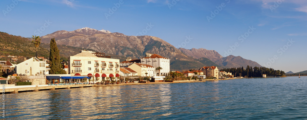 Beautiful Mediterranean landscape. Montenegro. View of the Bay of Kotor and the embankment of the city of Tivat on a sunny March day