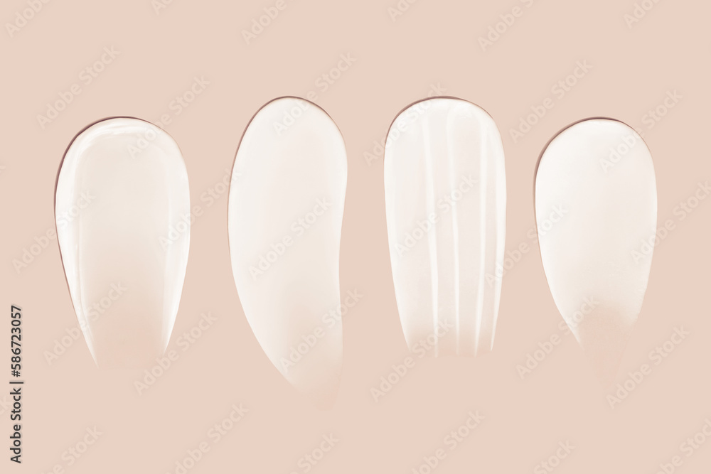Set of smears of cream texture on a beige background Set of smears of cream texture on a beige background