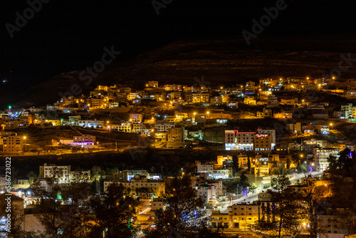 Wadi Musa, Jordan A night view of the city of Petra in the hills.