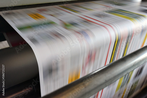 printing of coloured newspapers with an offset printing machine at a printing press company