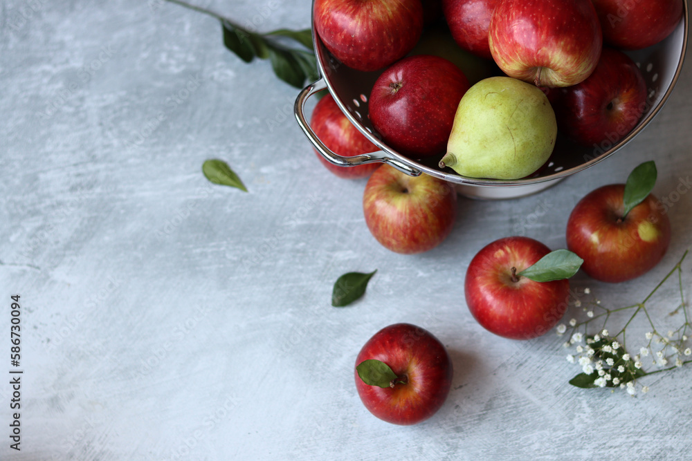 Beautiful shiny red apples on a table. Still life with organic fruit. Healthy eating concept. Beautiful shiny red apples on a table. Still life with organic fruit. Healthy eating concept.
