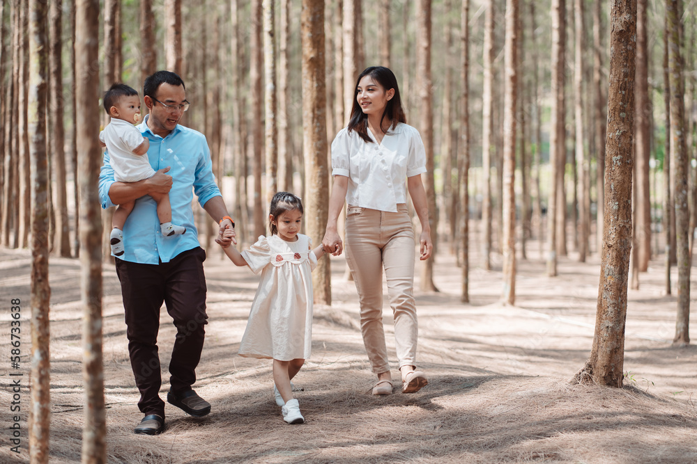 Happy family in the nature travel. family on weekend playing together in the forest. Happy family in the nature travel. family on weekend playing together in the forest.