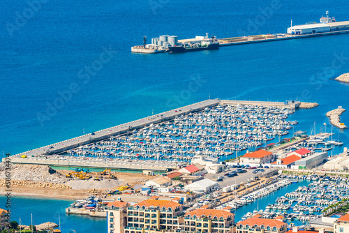 View of a marina in Gibraltar town and Bay of Gibraltar from The Upper Rock. UK