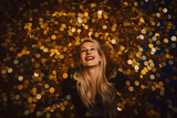 Happy smiling laughing with crazy look rich woman girl in a business suit lies on a pile of gold coins. Wealth drives you crazy Success business concept. Generative AI