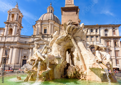 Fountain of Four Rivers (Fontana dei Quattro Fiumi) and Sant'Agnese in Agone church on Navona square, Rome, Italy