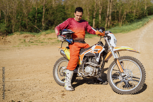 Extreme and Adrenaline. Motocross rider close up portrait. Motocross sport. Active lifestyle.