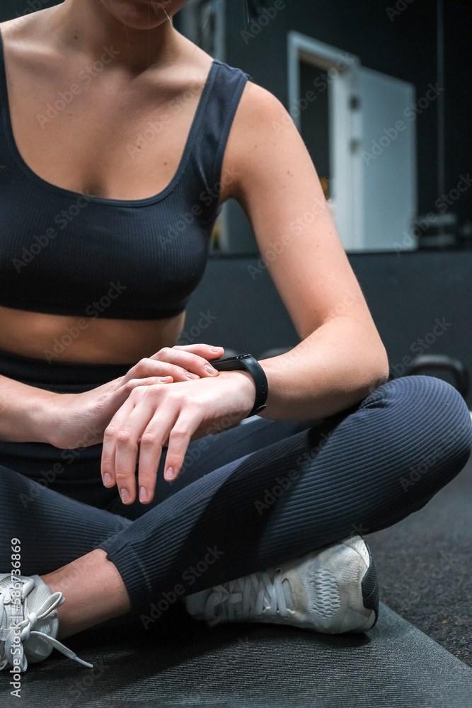 Obraz premium Sports fit Fitness hands, smart watch or future data on healthcare workout, body training or exercise Active lifestyle,personal care,health.Wellness,workout,physical health.Smart fit,healthy lifestyle