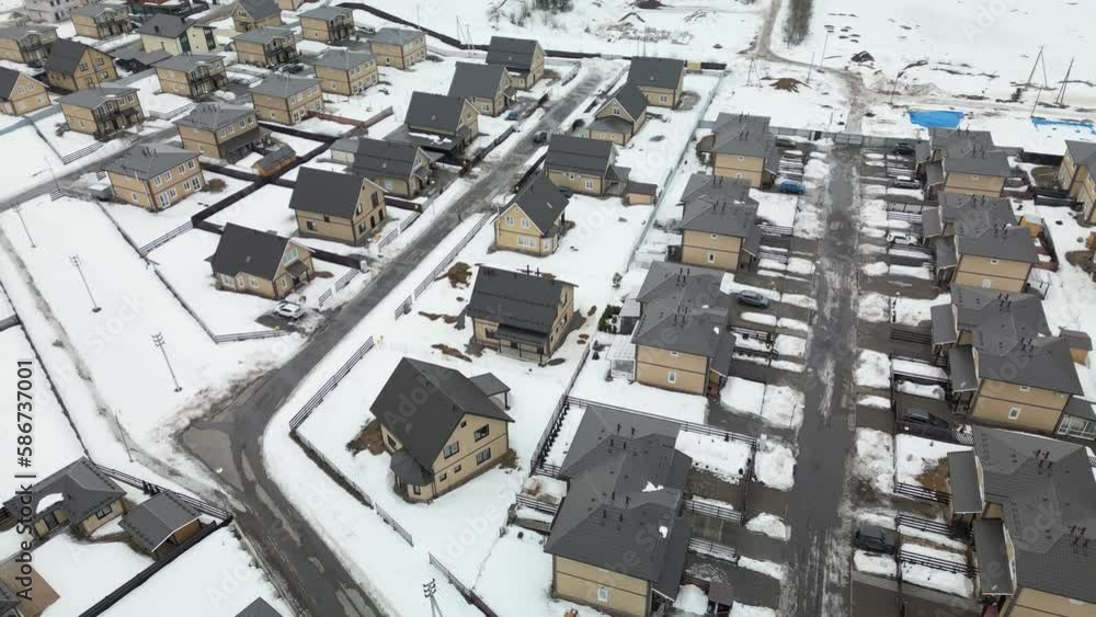 Country house shot from a quadcopter in winter Country house shot from a quadcopter in winter