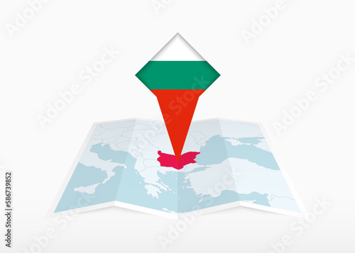 Free Download Bulgaria is depicted on a folded paper map and pinned location marker with flag of Bulgaria. - GFXLoad