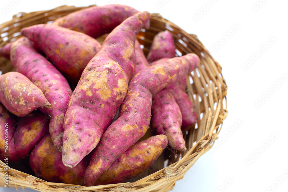 Sweet potato in bamboo basket on white background. Sweet potato in bamboo basket on white background.