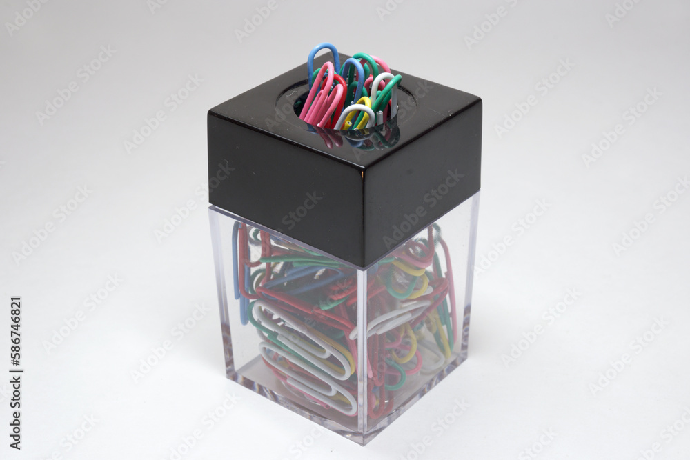 Obraz premium universal clip dispenser with magnetic square black lid many colored paperclips