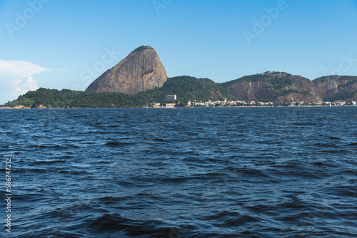 Guanabara Bay in Rio de Janeiro  Brazil with Sugarloaf Mountain in the background. Beautiful landscape and hill with the sea. Sunny summer day