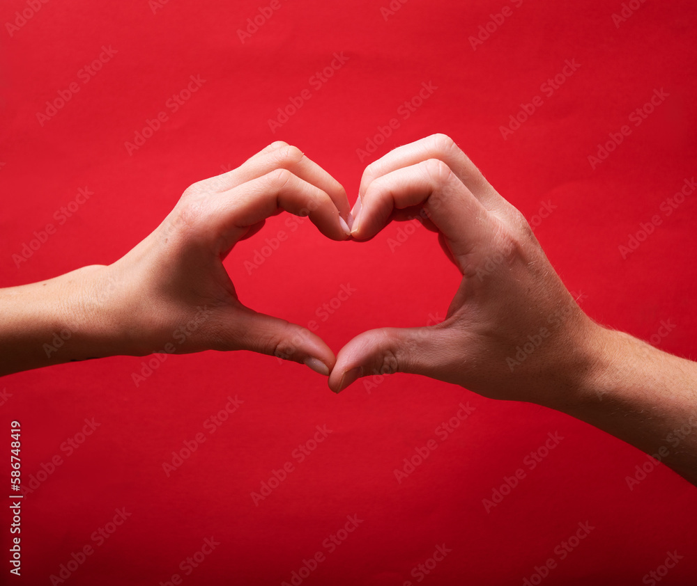 Hands making sign Heart isolated. Beautiful hands with copy space. Love concept on Valentine day Hands making sign Heart isolated. Beautiful hands with copy space. Love concept on Valentine day