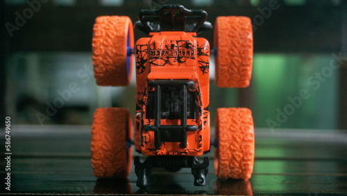 monster car toy with distinctive big wheels. This car can drive on broken terrain roads