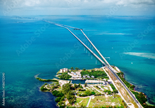 Florida Keys, USA. Aerial view of Highway 1 and Seven Mile Bridge and holiday home apartments condominiums near Marathon photo