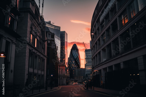 London streets at sunset. Road traffic in London. Banking district in city center of United Kingdom. Morning sunrise in England. Cityscape UK. Willis Building, Tower Exchange. AI Generative.