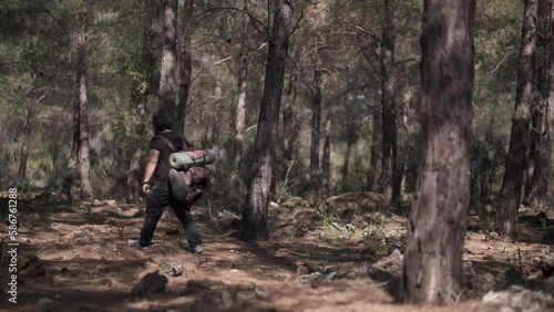 Wallpaper Mural Hiking with backpack in the forest Torontodigital.ca