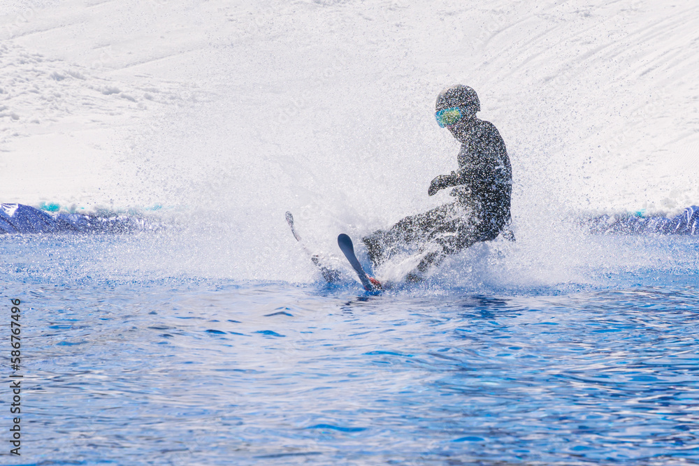 Fototapeta premium People are enjoying Pond skim at the end of ski season