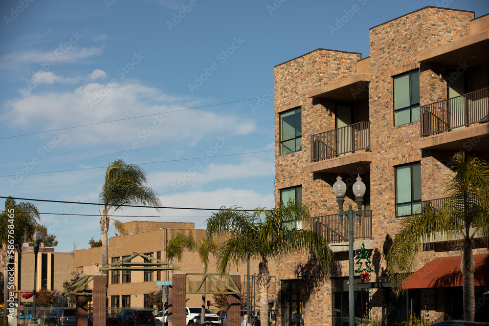 Lomita, California, USA - November 25, 2022: Afternoon sun shines on the urban core of downtown Lomita.