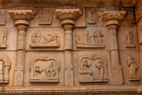 Medieval stone carvings on the walls of Hazara Rama temple built in the early 15th century at Hampi, Karnataka India