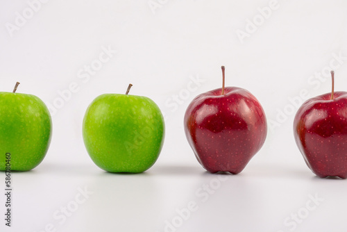 Fresh green and red apple fruit with cut in half and slice isolated on white background.