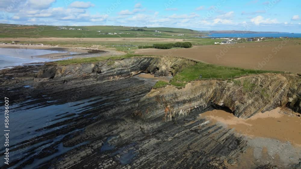 Layers and layers of eroded coastal land visible during low tide. Drone footage Ireland Layers and layers of eroded coastal land visible during low tide. Drone footage Ireland